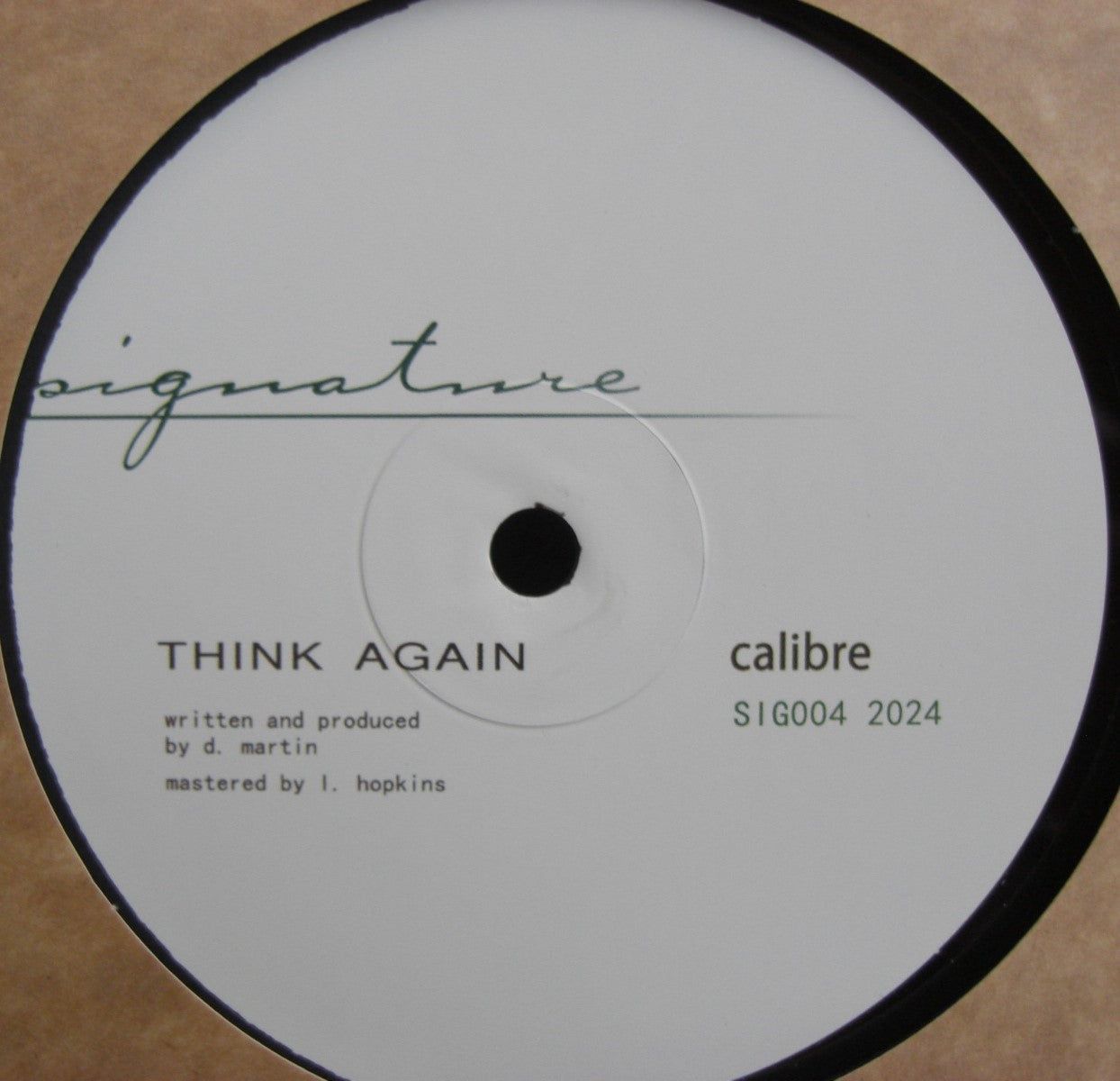 Calibre – Feeling Happy / Think Again Vinilo, sencillo de 12"